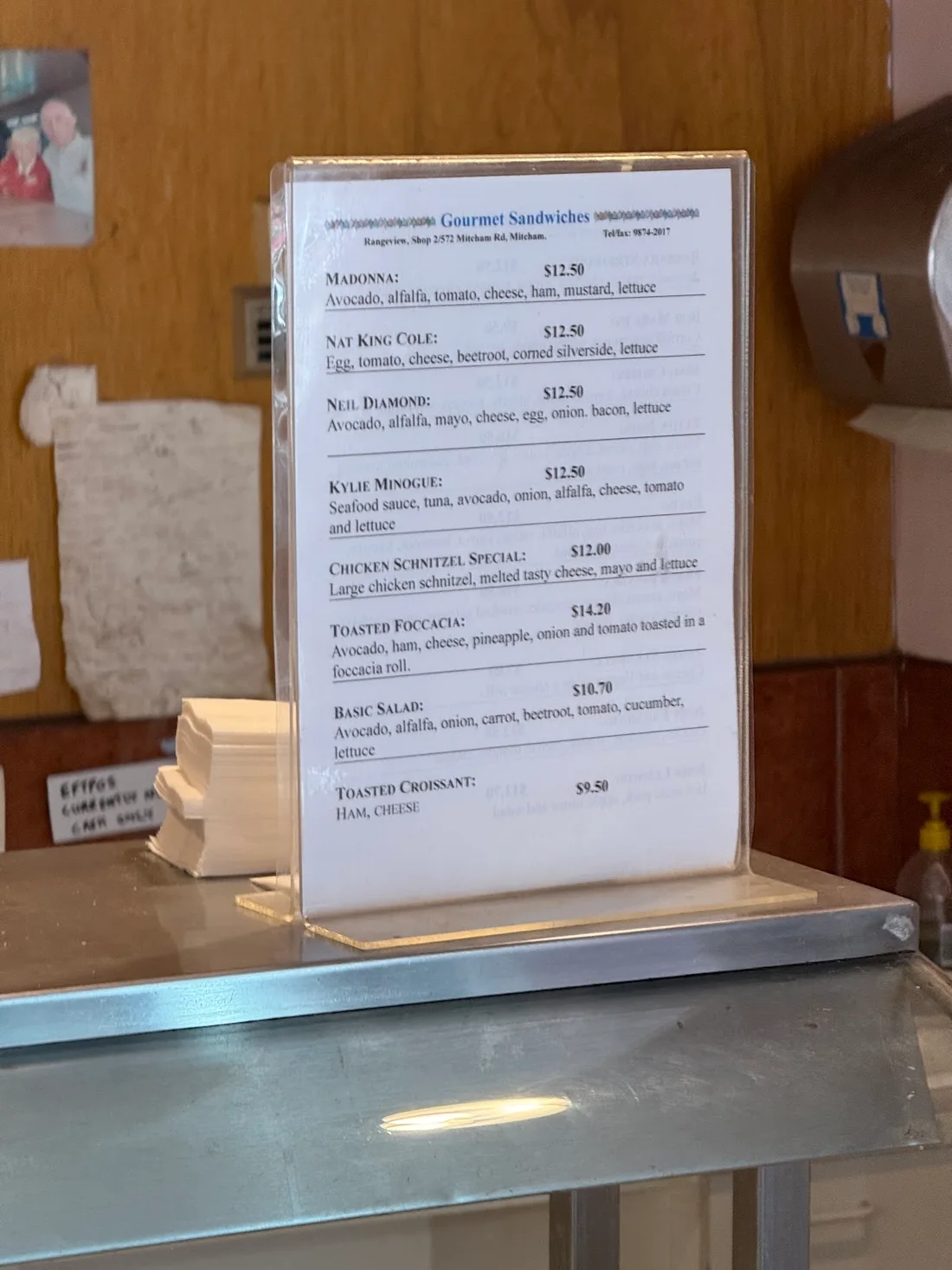 The cafe's printed gourmet sandwich menu, photographed on Google Maps in January 2025